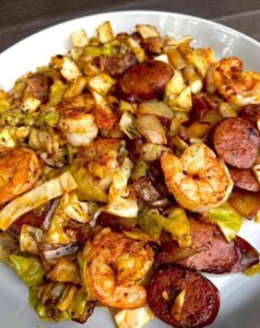 FRIED CABBAGE WITH SHRIMP, SAUSAGE & BACON
